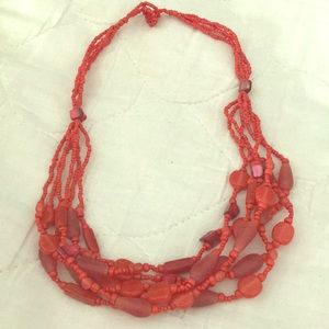 Multi strand red bead necklace